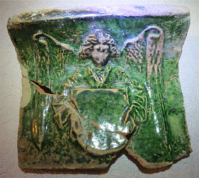 carreau de poelle décoré d'un ange